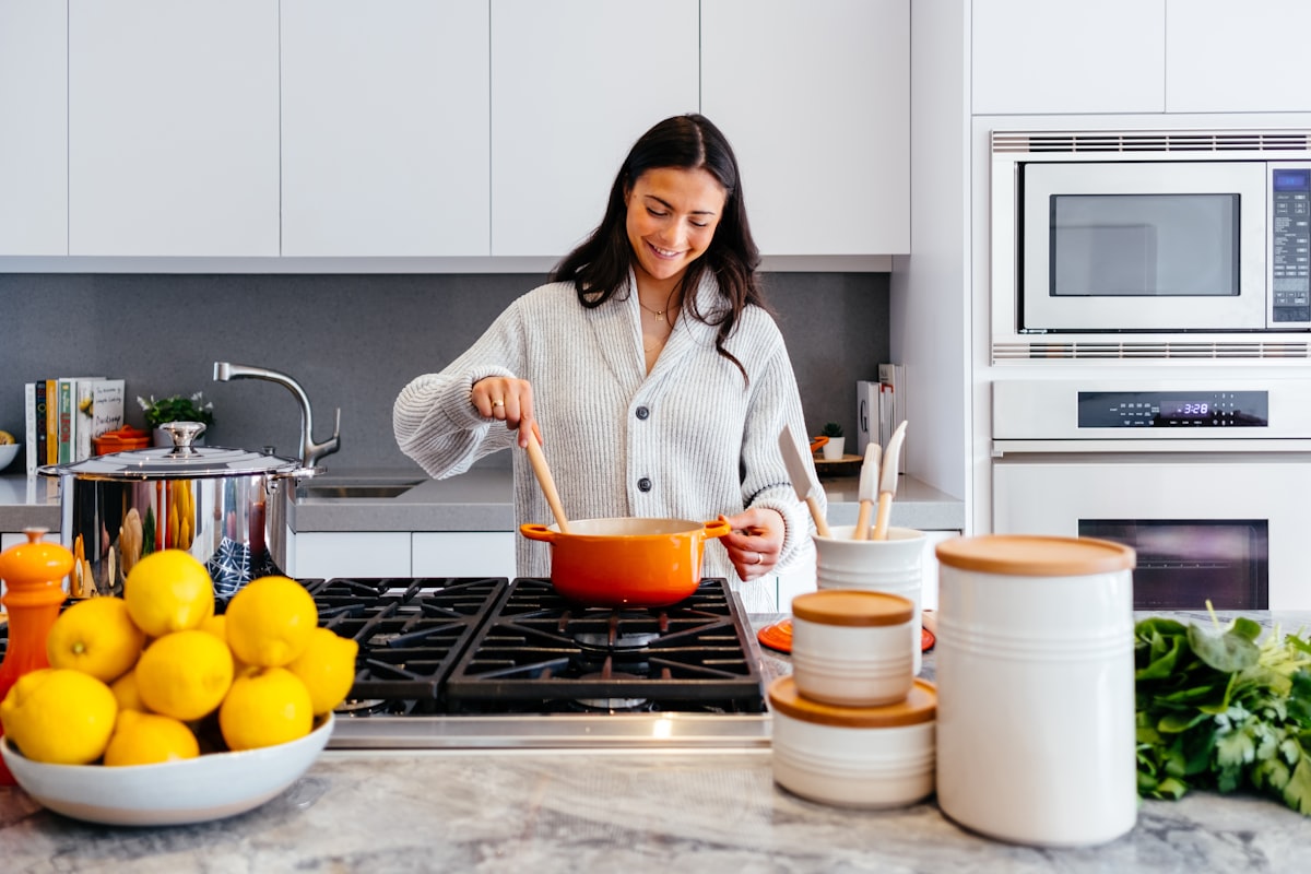 Budget-friendly healthy meal preparation with fresh vegetables and pantry staples